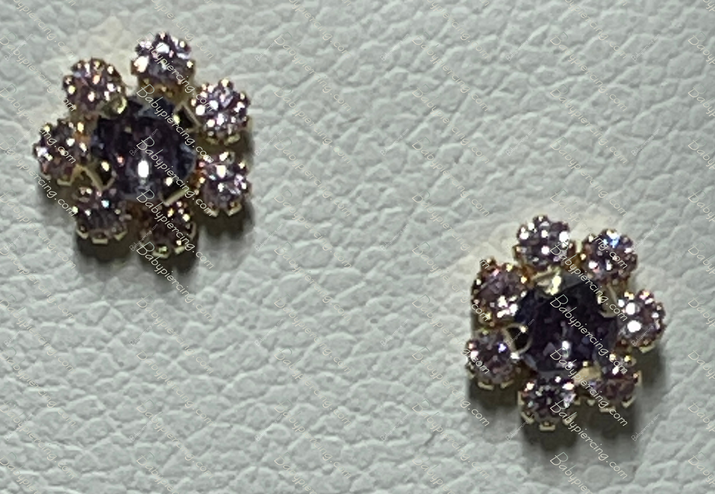 FLOWER DESIGN WITH 
7 CUBIC Z WITH PURPLE CENTER CZ
